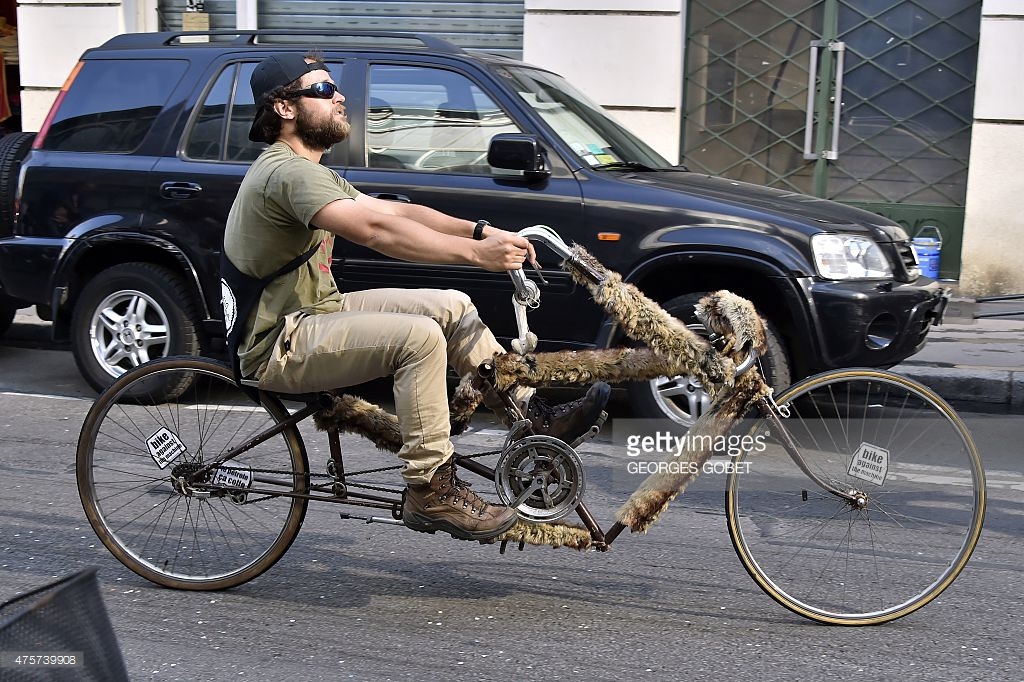 man-rides-a-recumbent-bike-as-he-takes-part-in-the-bike-parade-during-picture-id475739908